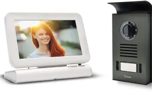 Interphone vidéo Extel Lesli : écran blanc avec une femme souriante, unité extérieure grise avec caméra et nom de marque.